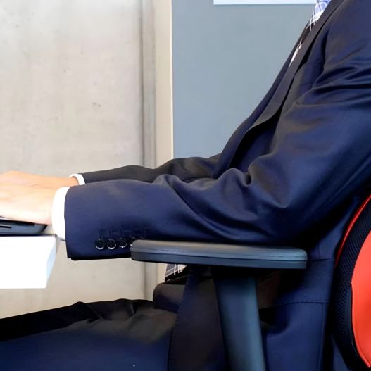 What is the criteria for ergonomic armrests?